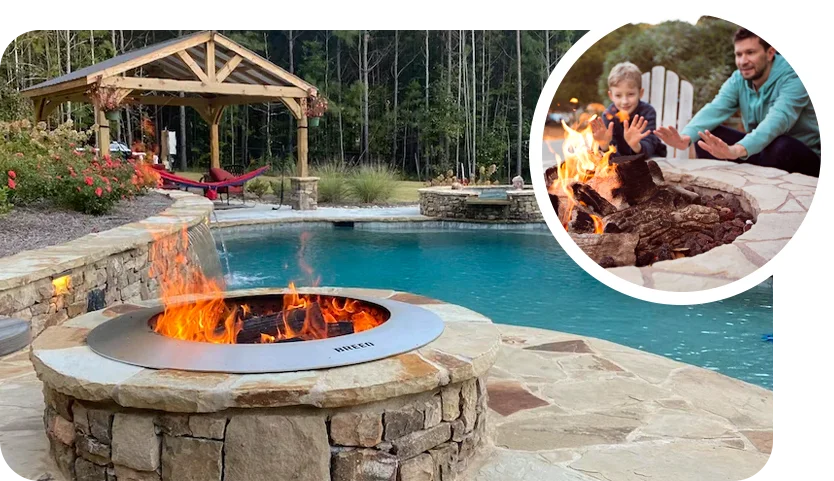 father and son enjoying firepit next to pool